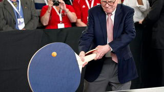 Here's Warren Buffett Swinging A Ridiculous, Supersize Ping-Pong Paddle